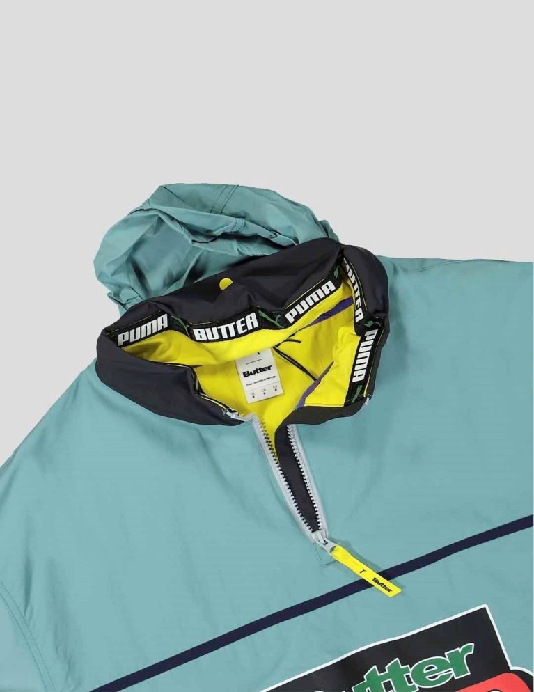 Colaboraciones PUMA x butter goods lightweight pop over top mineral blue