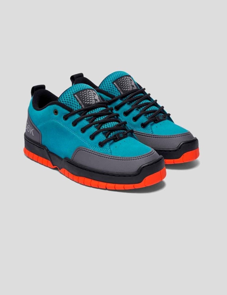 Colaboraciones DC x bronze clocker 56k dark teal 