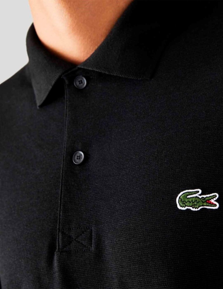Camiseta LACOSTE polo regular fit en algodón ecológico noir