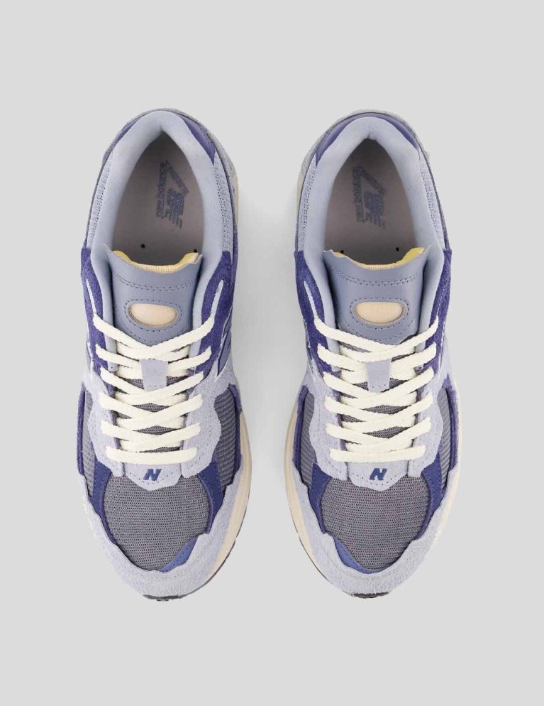 Zapatillas NEW BALANCE 2002r light artic grey/purple
